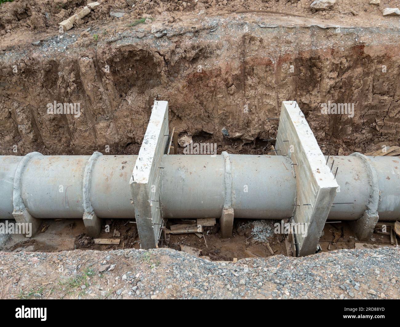 The concrete pipe under the dirt road for the irrigation system under