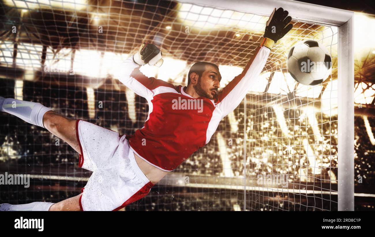 Close up of a soccer goalkeeper saving the ball at the corner of the goalposts Stock Photo