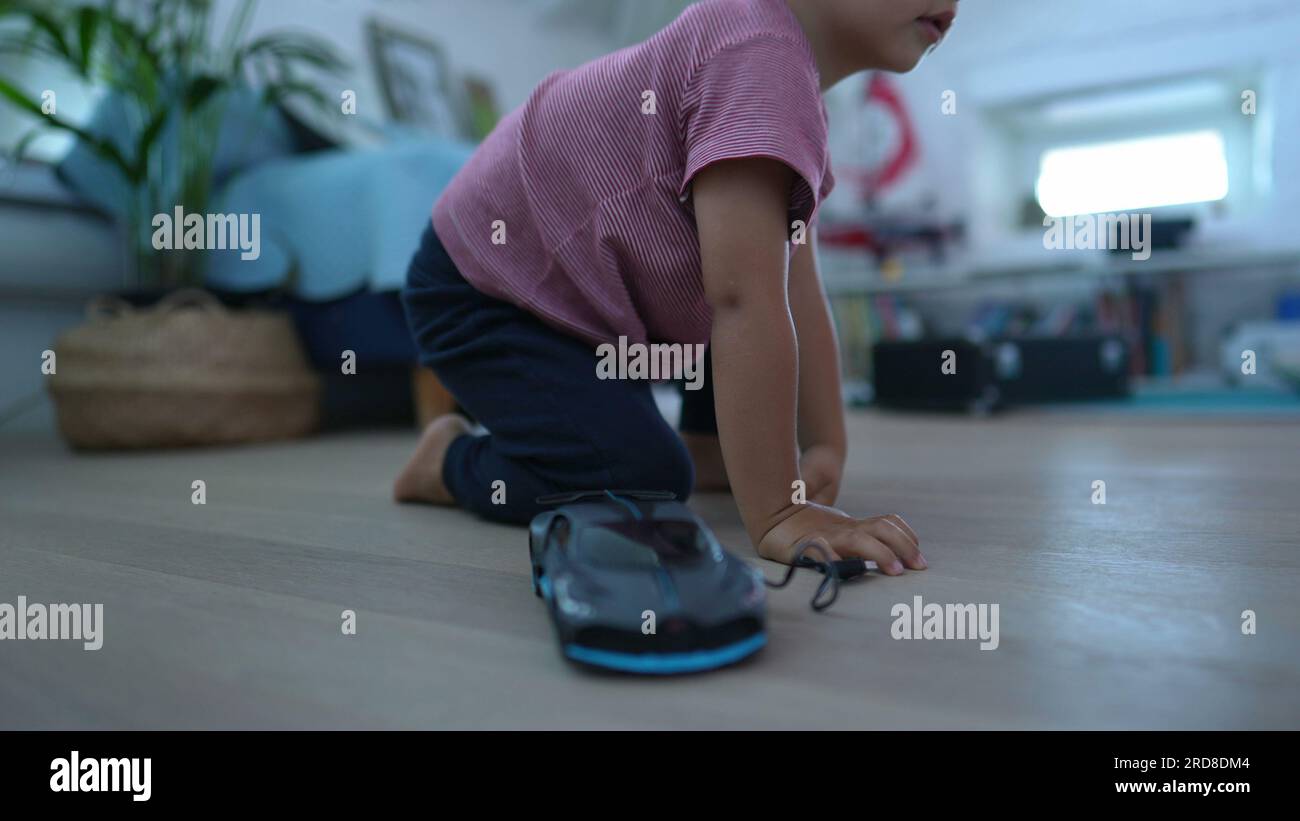 Child getting up from floor kid standing up Stock Photo Alamy