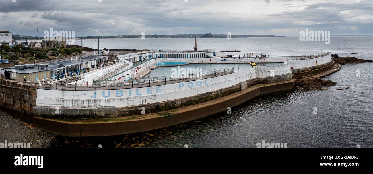 PENZANCE, CORNWALL, UK - JULY 4, 2023. Aerial panorama landscape of the exterior of The Jubilee outdoor swimming pool in Penzance, Cornwall Stock Photo