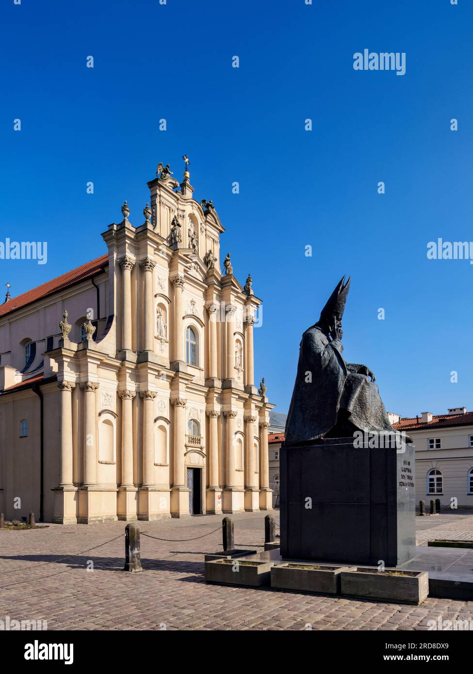 Statue of Wyszynski and Roman Catholic Church of the Visitants, Krakowskie Przedmiescie, Warsaw, Masovian Voivodeship, Poland, Europe Stock Photo