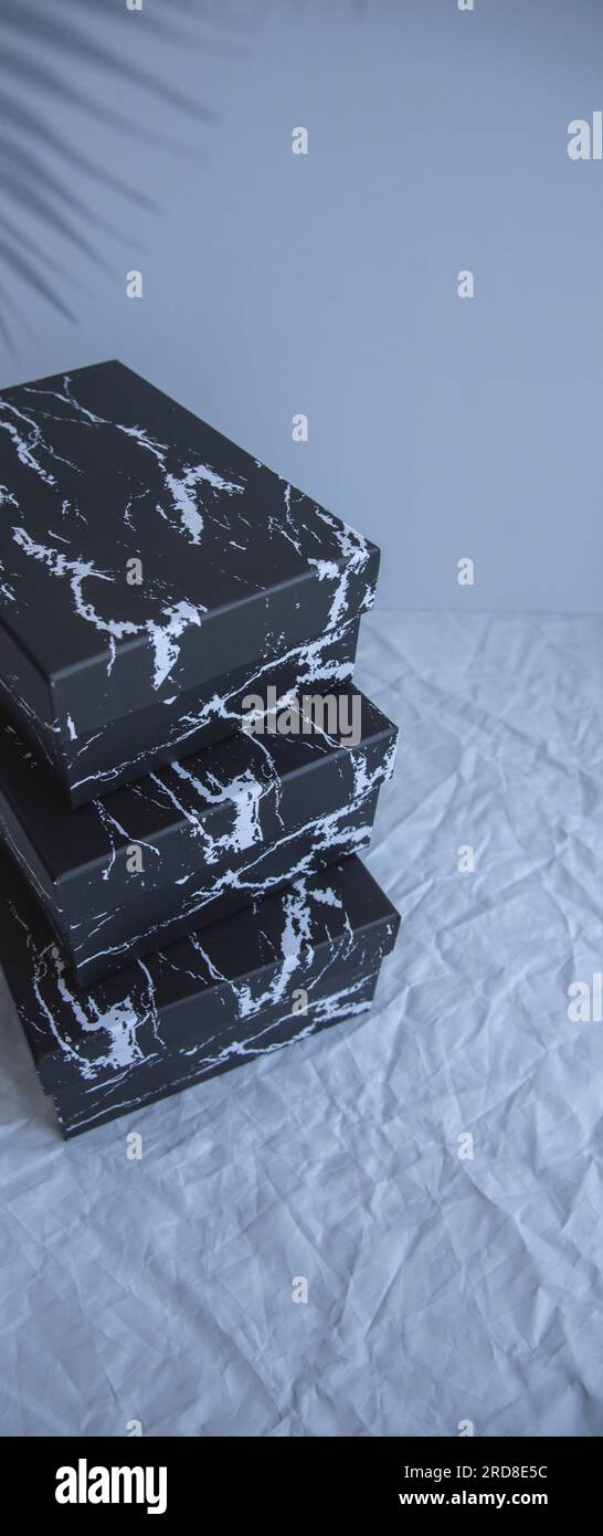 Blank black cardboard boxes for good and gifts. boxes for packaging goods from stores.festive