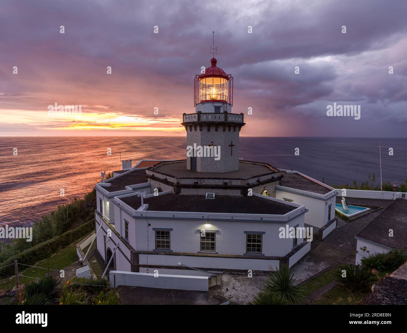 Farol do Arnel lighthouse at sunrise in a cloudy morning, Sao Miguel island, Azores, Portugal, Atlantic, Europe Stock Photo