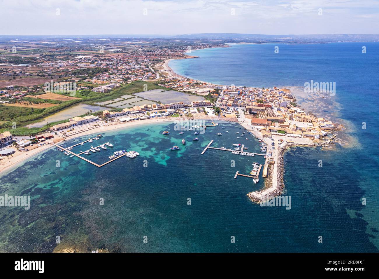 Aerial drone shot of the fishing village of Marzamemi in blue water, Marzamemi, Pachino municipality, Siracusa province, Sicily, Italy, Mediterranean Stock Photo