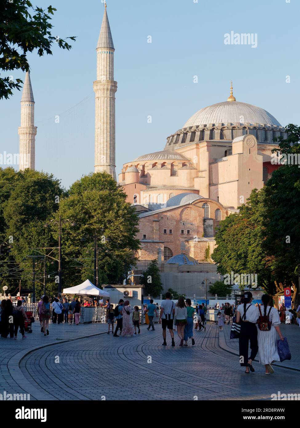People in Sultanahmet Park on a summers evening with the Hagia Sophia ...