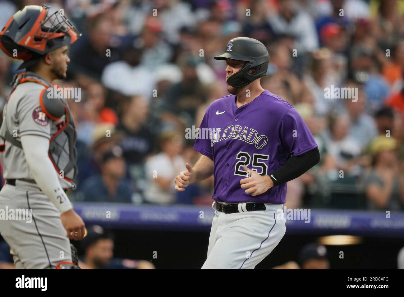 July 18 2023 Colorado first baseman CJ Cron (25) scores a run during the  game with Houston Astros and Colorado Rockies held at Coors Field in Denver  Co. David Seelig/Cal Sport Medi(Credit