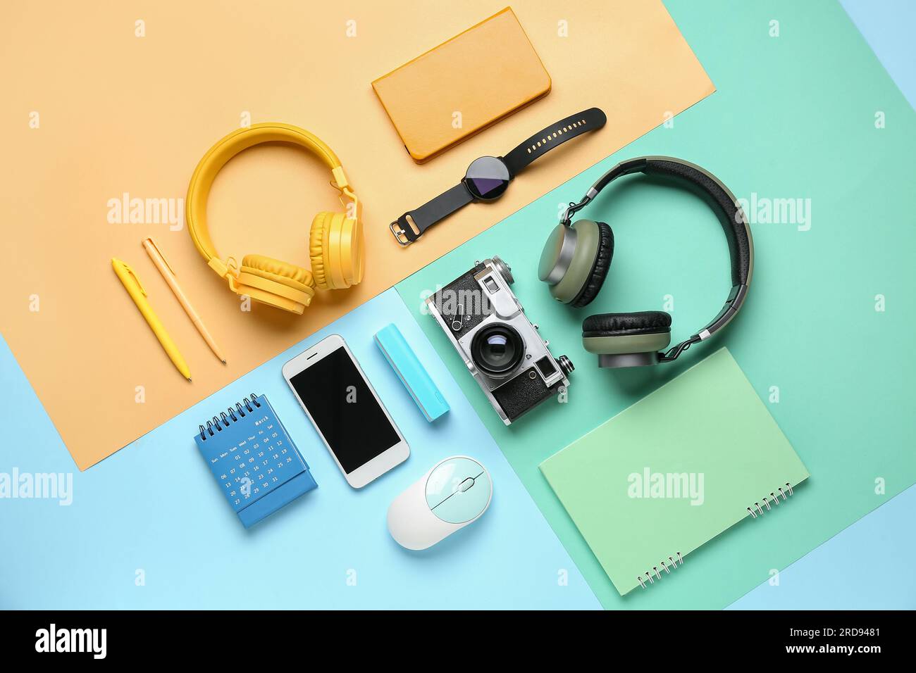 Composition with different gadgets and stationery on color background Stock Photo