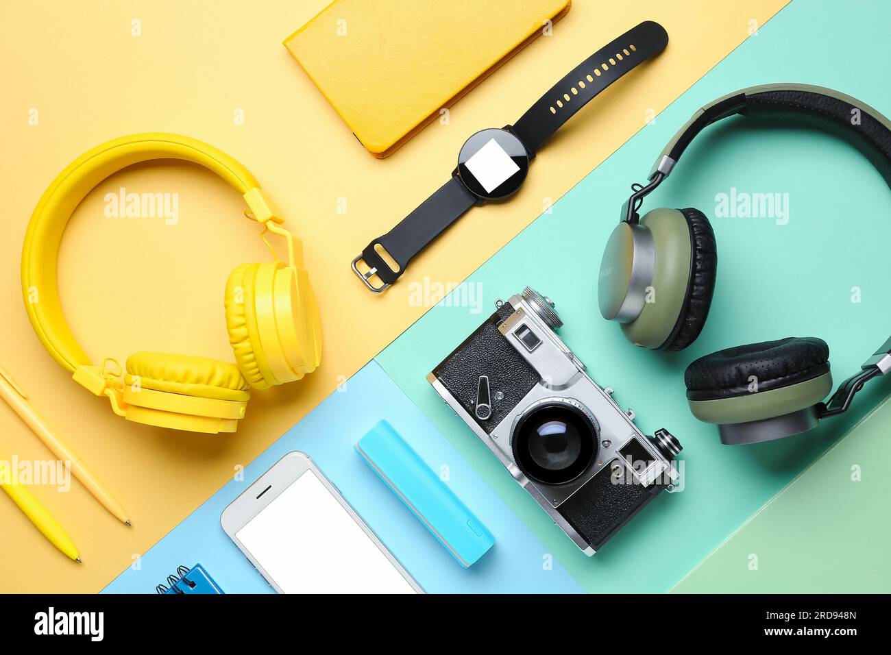 Composition with different gadgets and stationery on color background Stock Photo