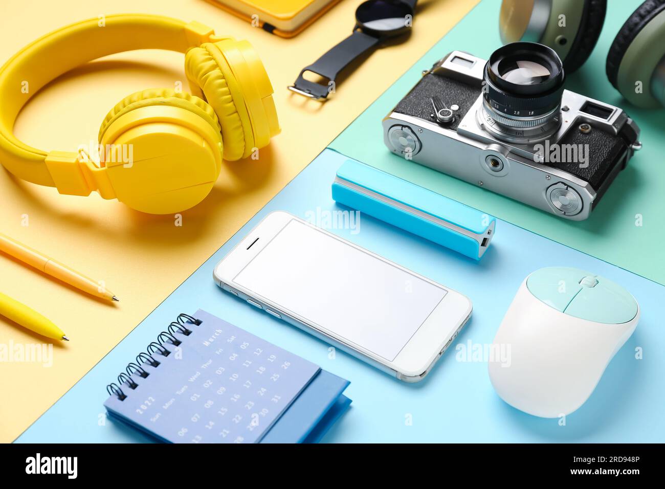 Composition with different gadgets and stationery on color background Stock Photo