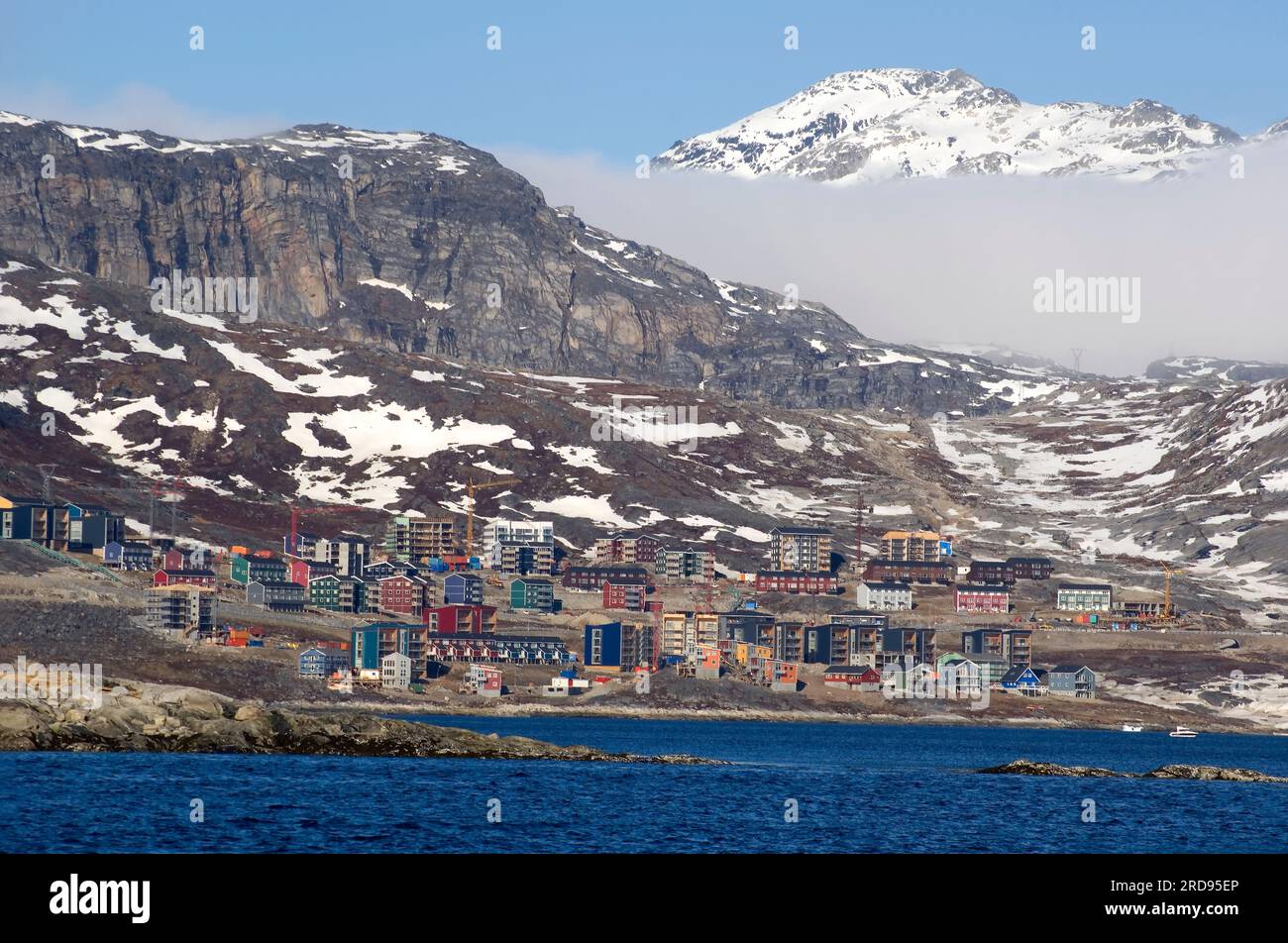 Homes and construction cranes in newly developed area of Nuuk