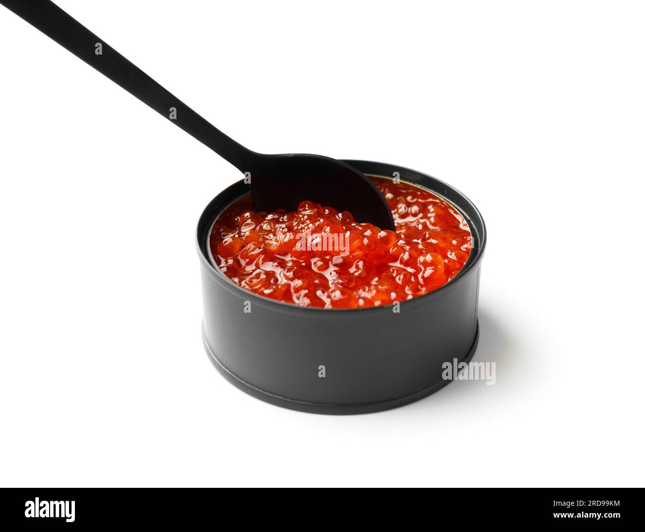 Red salmon caviar in a black tin can and in a black decorative spoon on