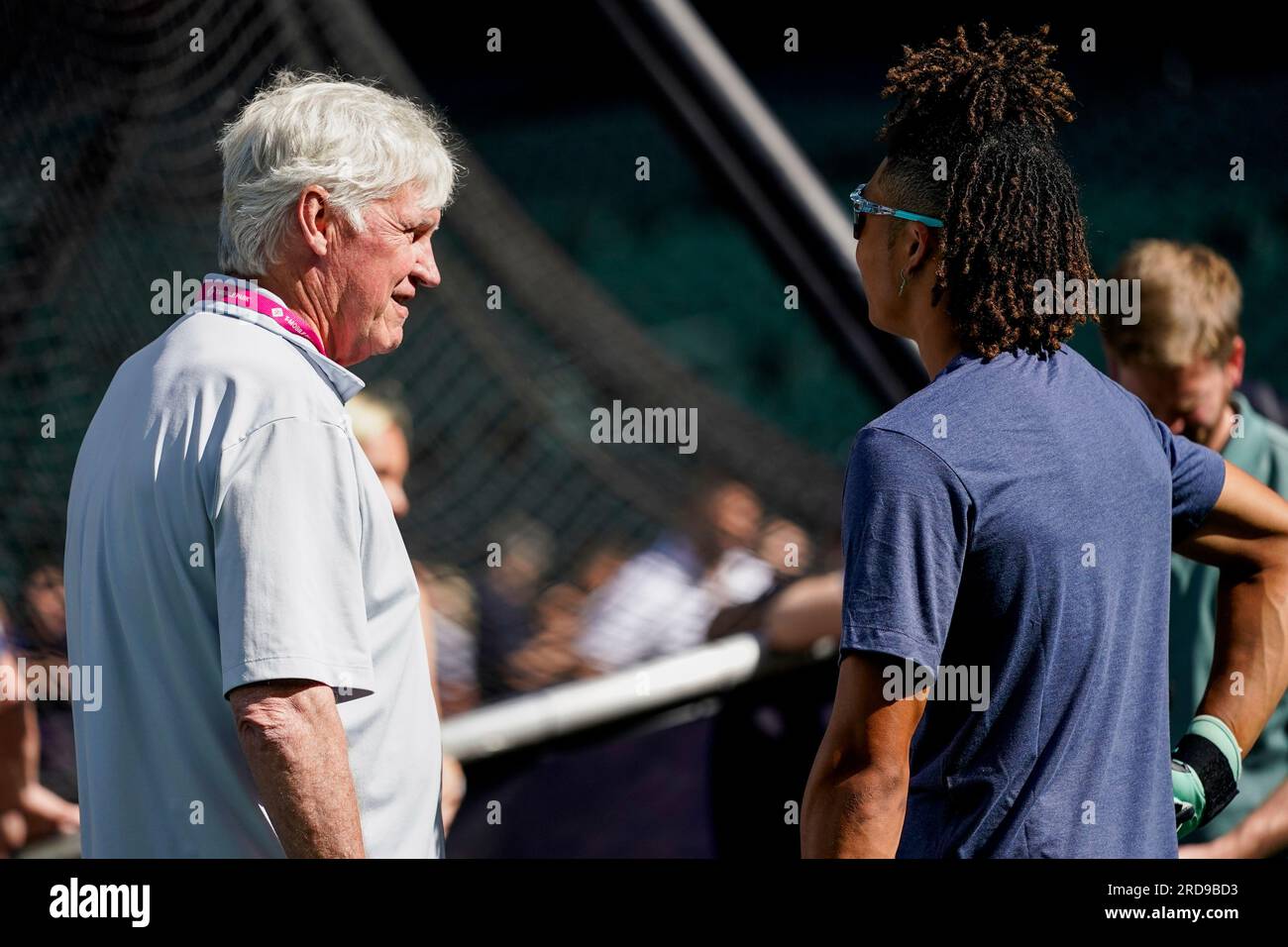 Seattle Mariners owner John Stanton, left, talks with 2023 firstround