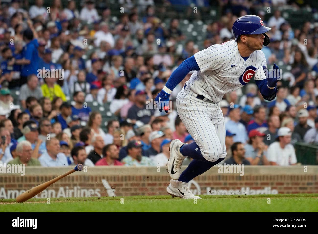Chicago Cubs' Nico Hoerner runs after hitting a single against the