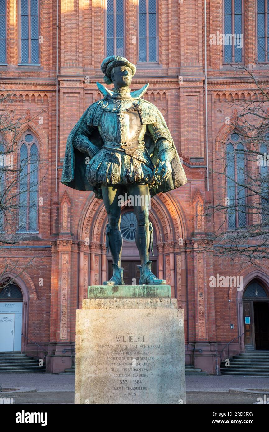 Wiesbaden, Germany - January 21, 2020: Bronze statue, monument to William the Silent, in front of the neo-Gothic Marktkirche church, Wiesbaden, Hesse, Stock Photo
