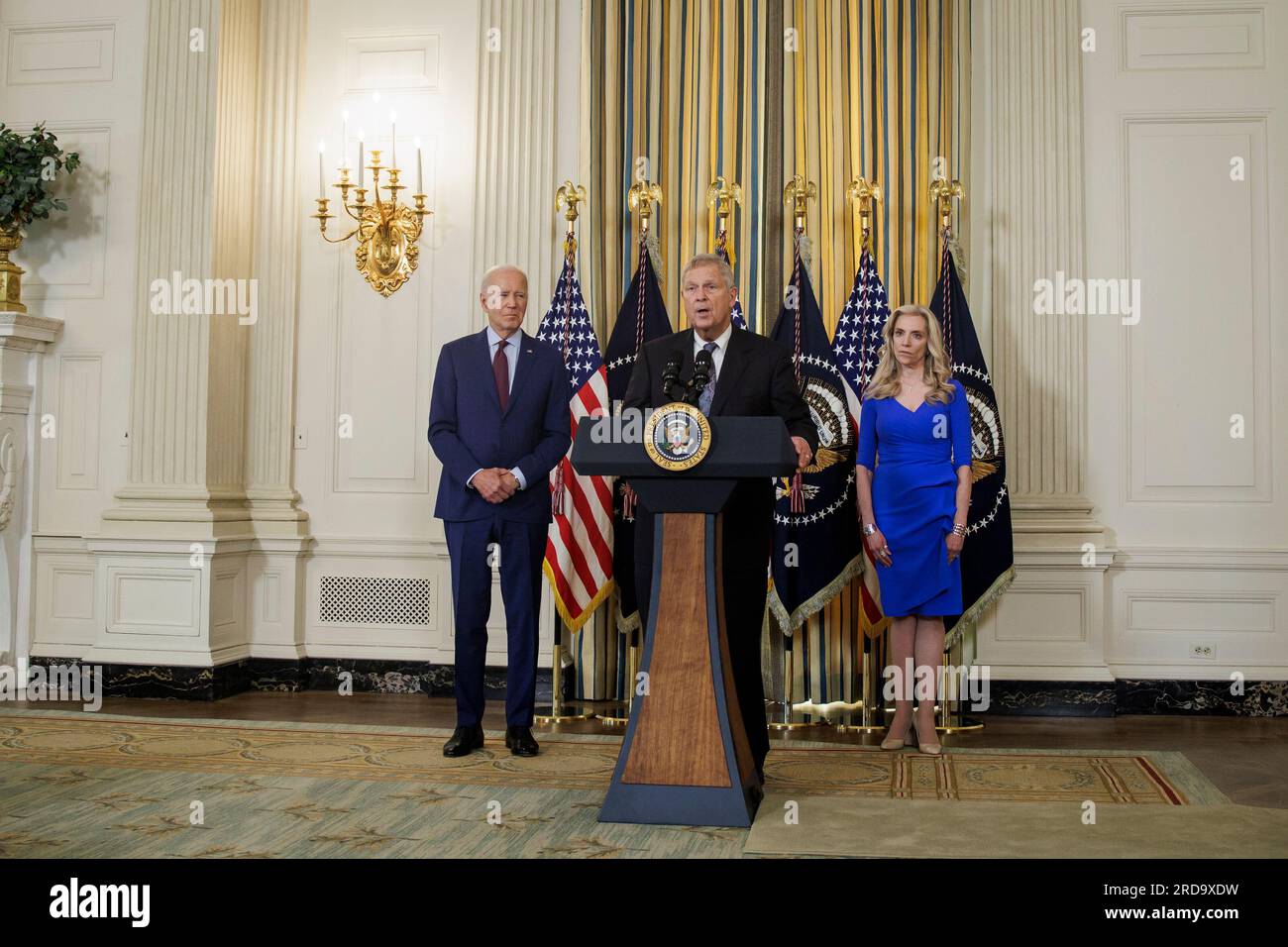 United States Secretary of Agriculture Tom Vilsack center speaks