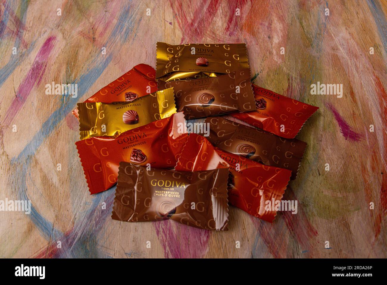 A variety of individually wrapped Godiva chocolates Stock Photo Alamy