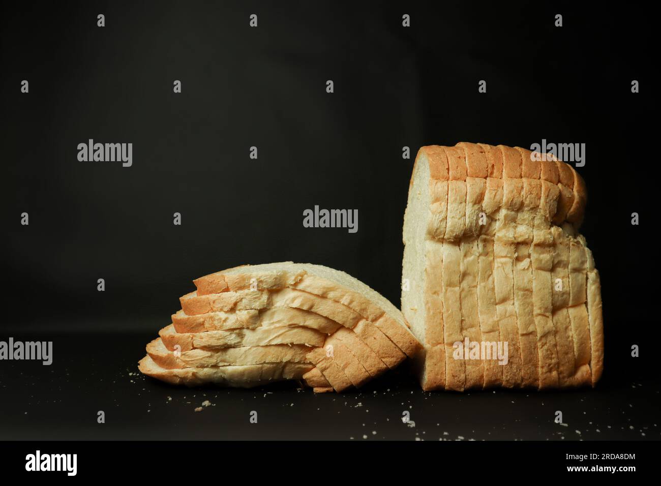 Sliced bread on black background. closeup of photo Stock Photo
