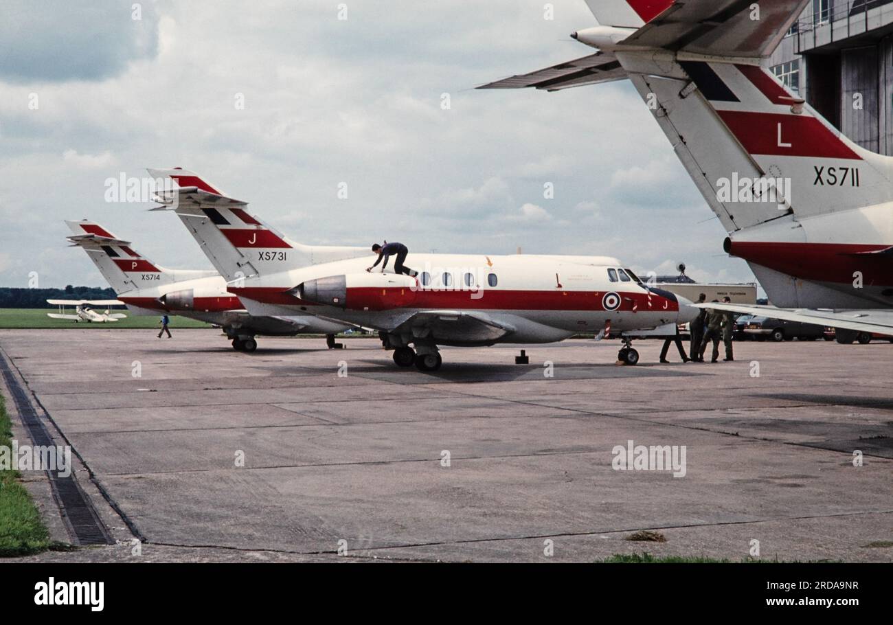 Three Royal Air Force Hawker Siddeley HS.125 Dominie Jet Transport Aircraft, at an RAF Base in UK during the 1980s. Aircraft are XS711, XS731, and XS714. Stock Photo