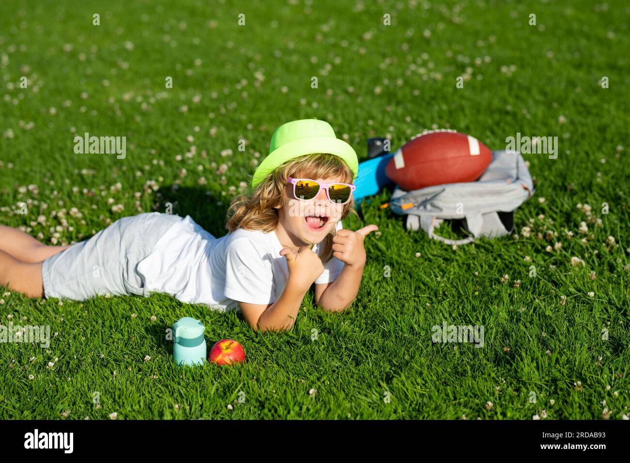 Child having fun outside. Happy children rest fun outdoors. Kids ...