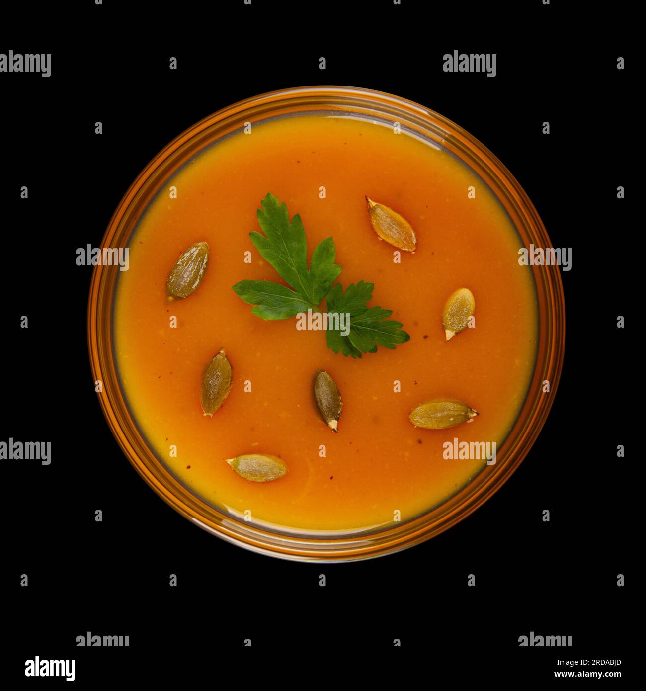 Pumpkin cream soup isolated on black background Stock Photo