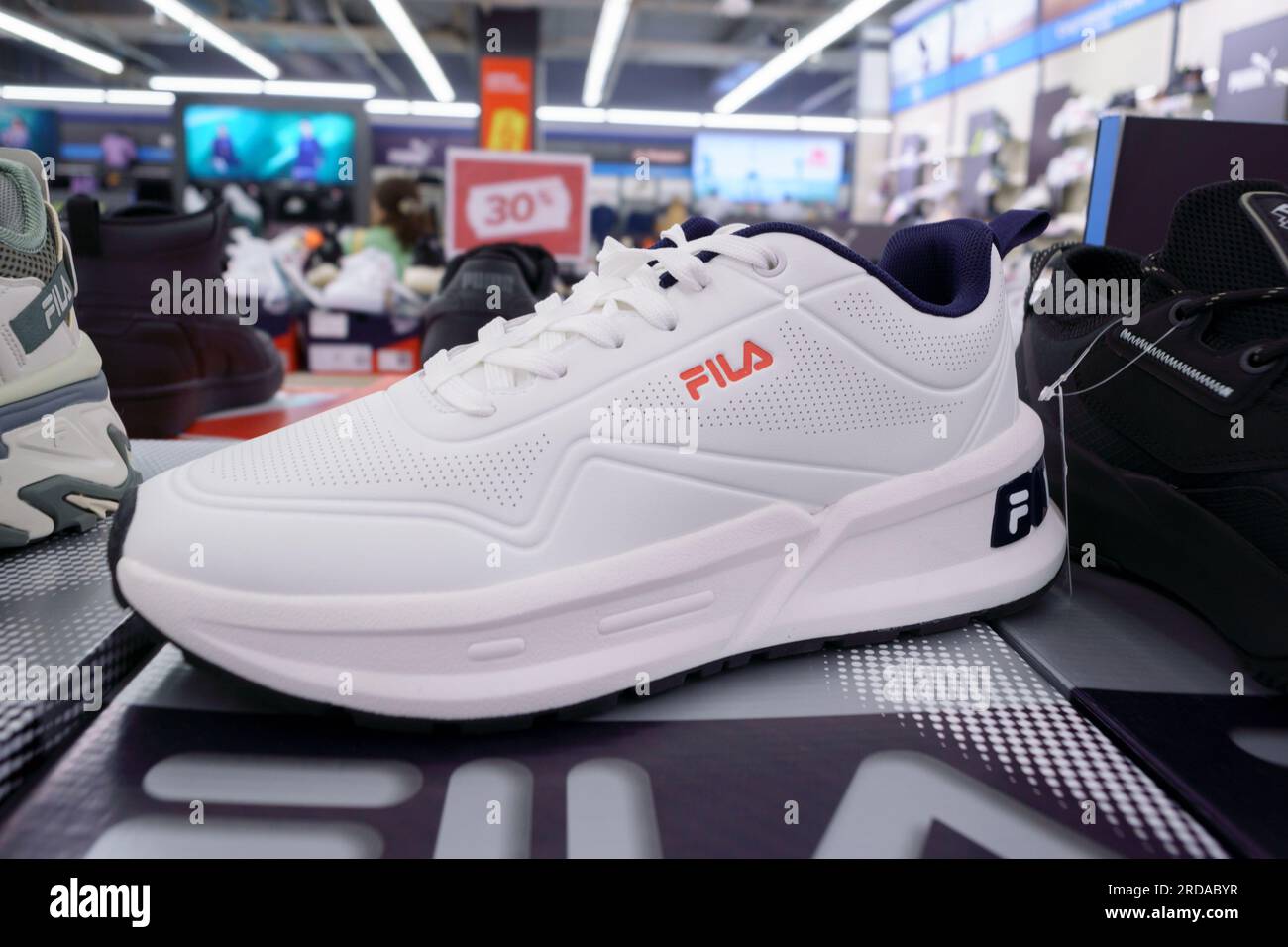 Tyumen, Russia-July 11, 2023: Fila white shoe. Fila is one of the world's  largest sportswear manufacturing companies Stock Photo - Alamy