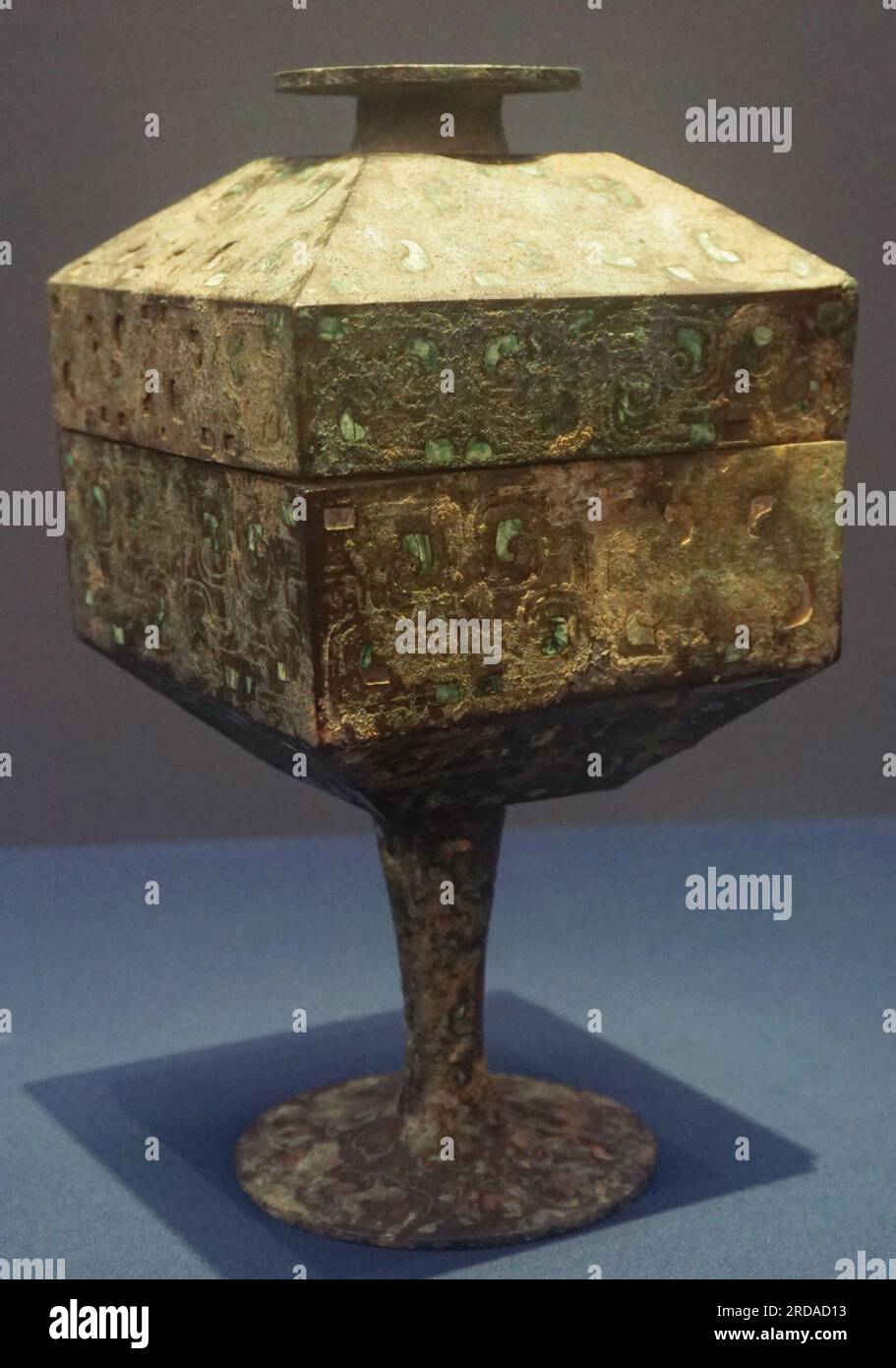 HANGZHOU, CHINA - JULY 20, 2023 - Photo taken on July 20, 2023 shows malachite-inlaid moire copper square beans of the Warring States period at the Xi Stock Photo