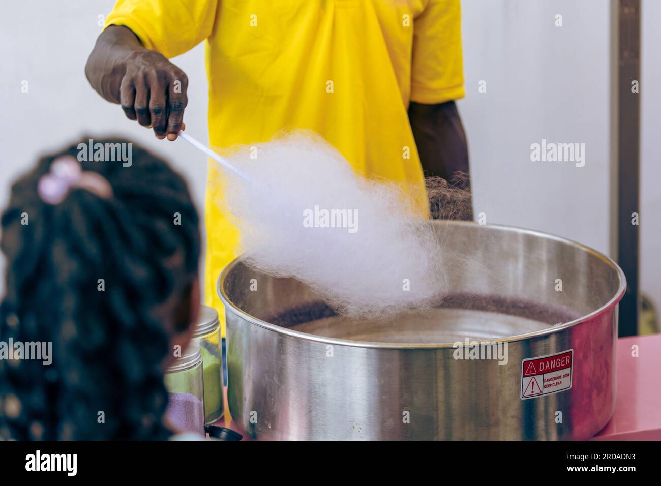 Vendor makes Cotton Candy for kids Outdoors Stock Photo