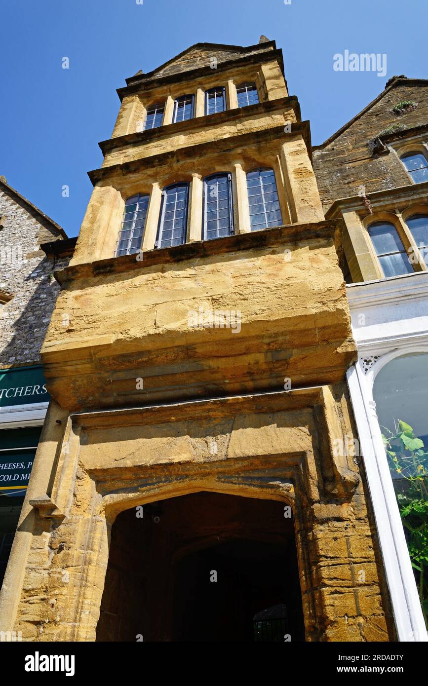Stone entrance arch and the windows to the Manor Court House along Fore Street, Chard, Somerset, UK, Europe. Stock Photo