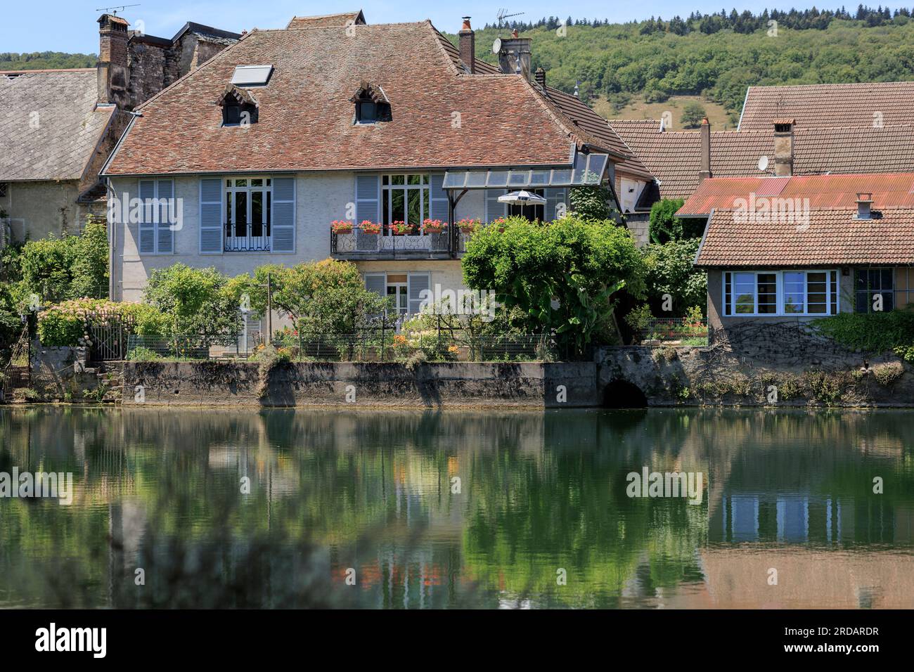 Riverside houses on the Loue River, Quingey, Besancon, Doubs, Bourgogne-Franche-Comte, France Stock Photo