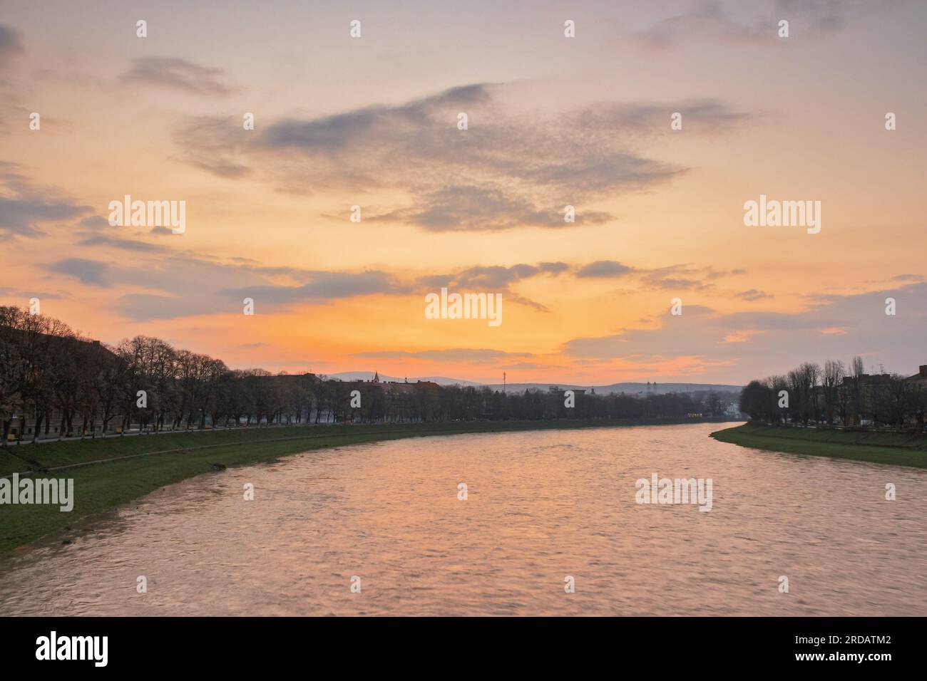 waterfront of the old town. cityscape in morning light. beautiful glowing sky Stock Photo