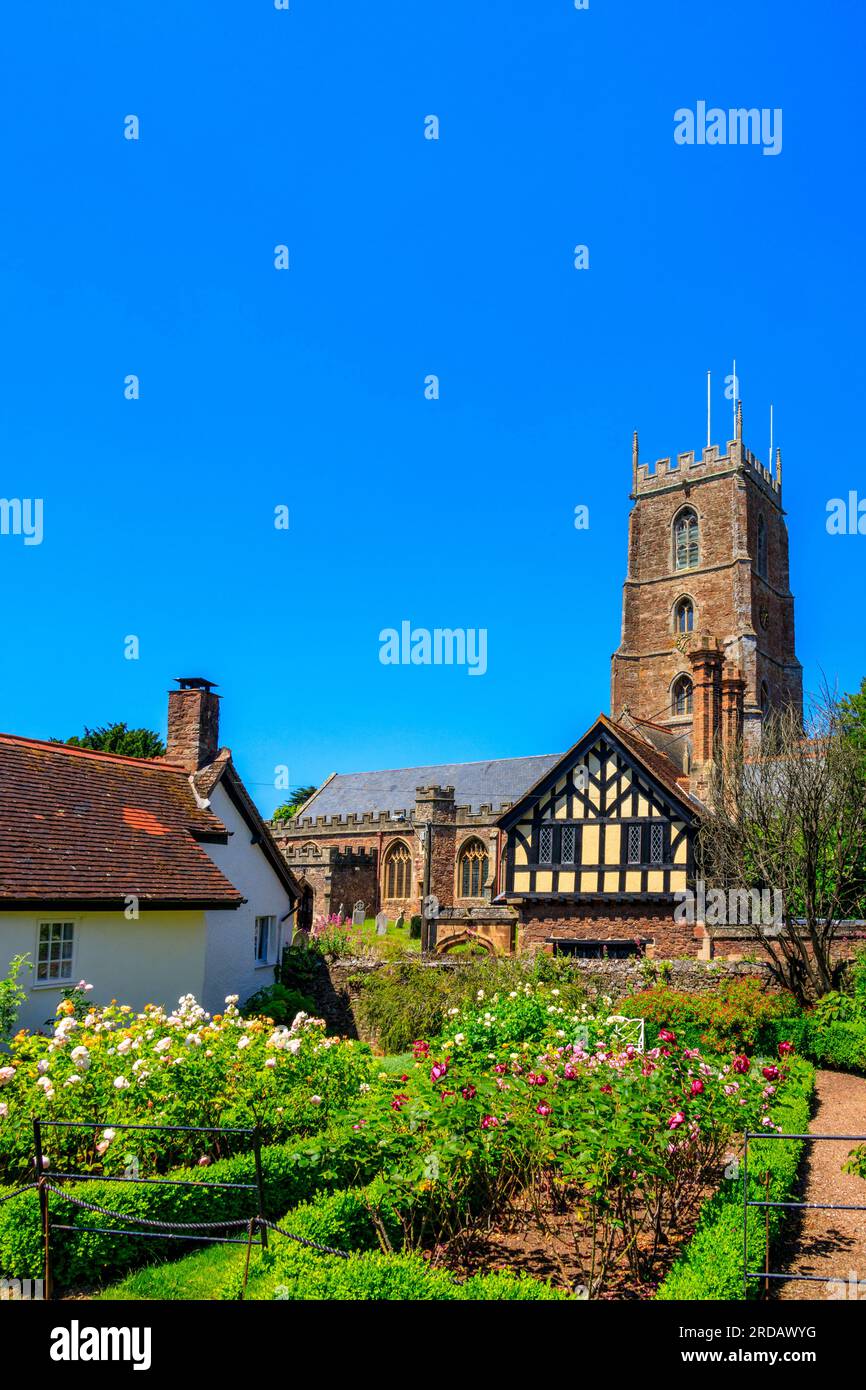 Dunster parish church of St viewed from the Dream Garden at