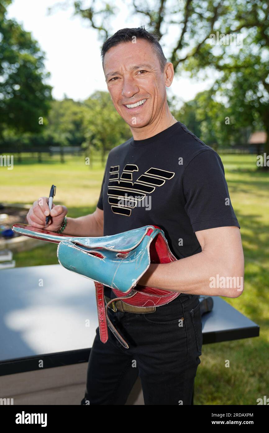 File photo dated 09/06/23 of Frankie Dettori signs memorabilia at his home in Newmarket, Suffolk, ahead of a sale of his prizes, trophies, racing silks, weighing scales and other racing mementoes at Cheffins auction house. The memorabilia has sold at auction for tens of thousands of pounds after the horse racing great had a clear-out. Issue date: Thursday July 20, 2023. Stock Photo