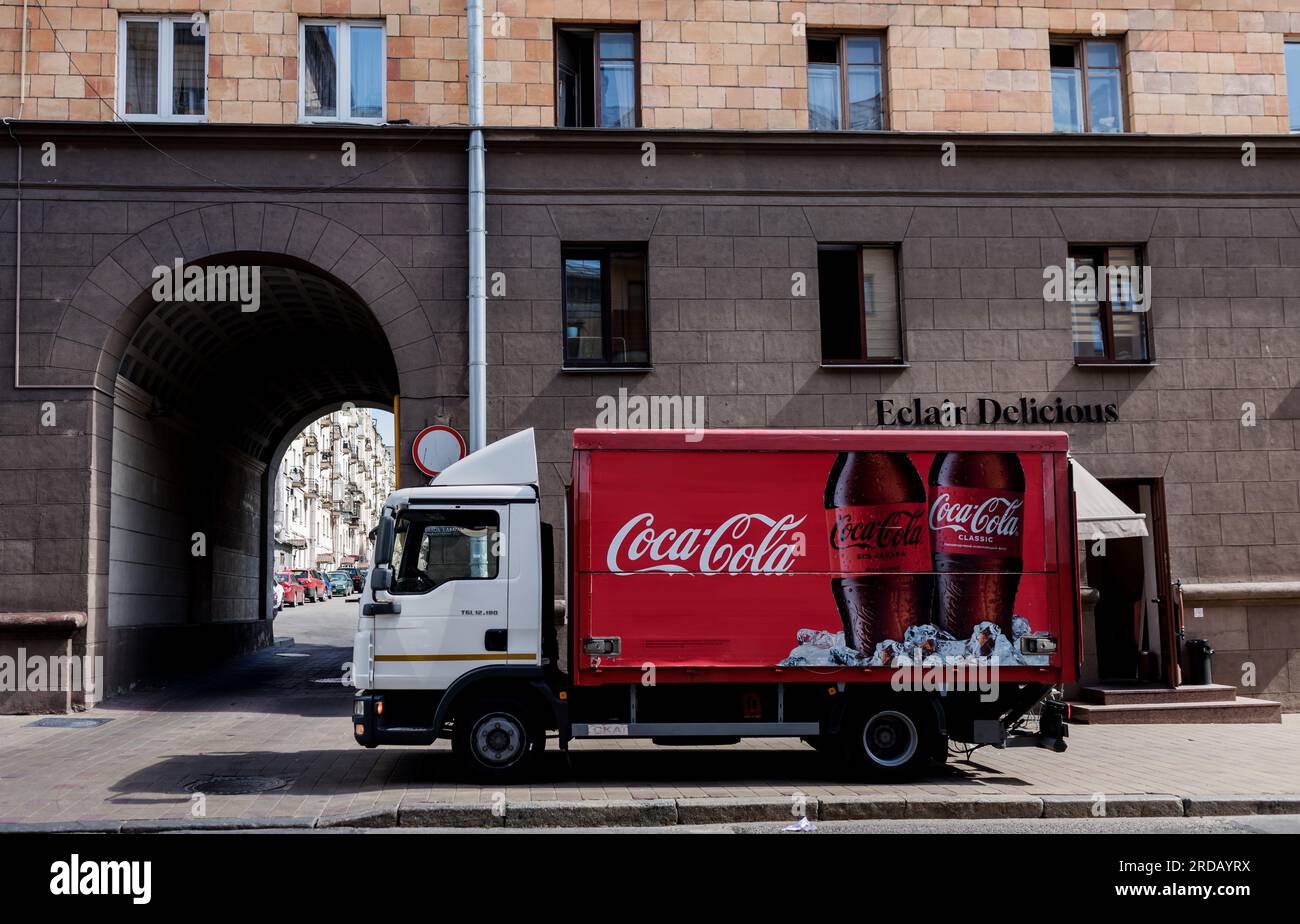 Minsk, Belarus, July 2023 -  Red Coca-Cola delivery truck parked in the street Stock Photo