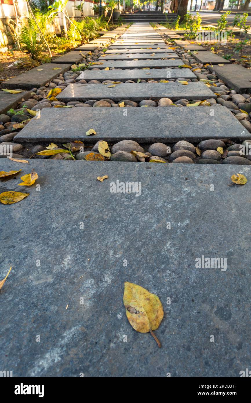A well maintained pavement made of stone tiles and pebbles. Uttarakhand India. Stock Photo