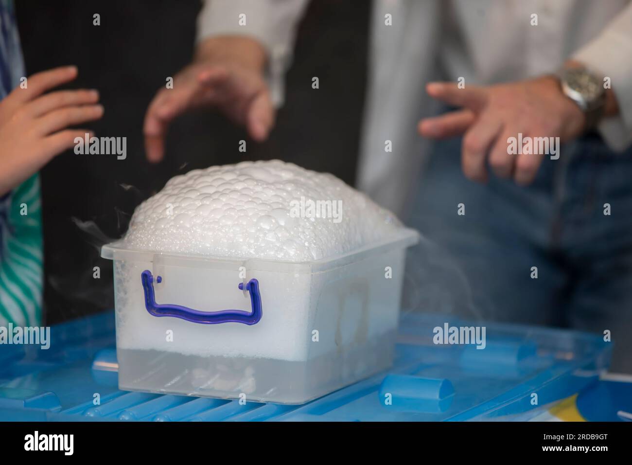 Laboratory chemistry experiment with foam and steaming Stock Photo Alamy