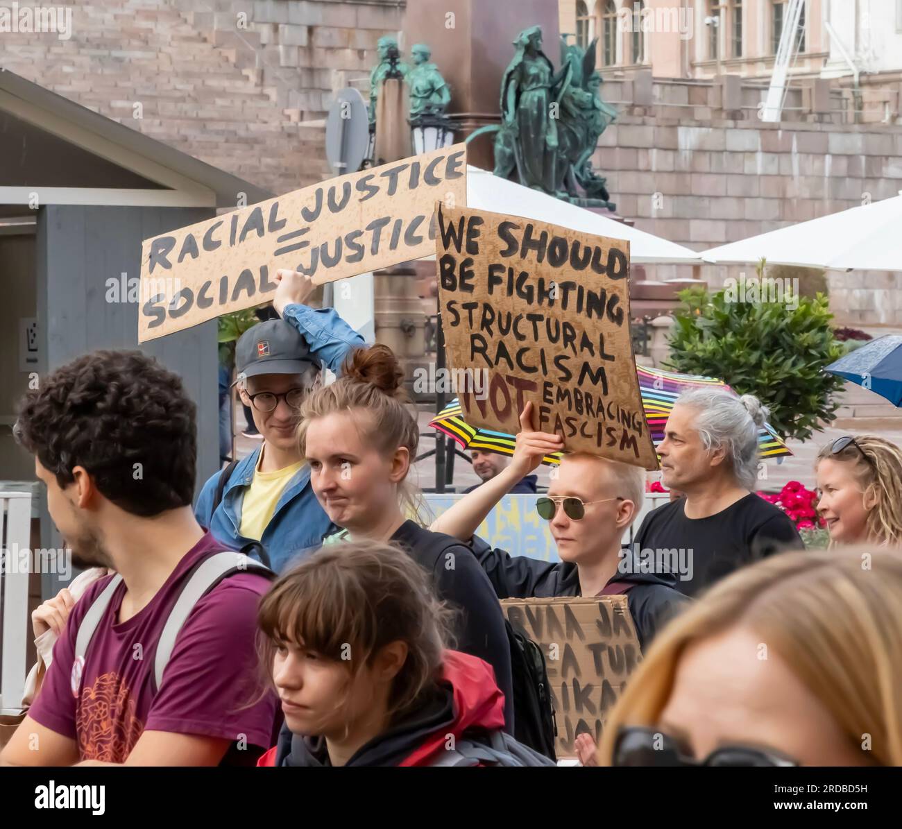 Participants in the ’Zero tolerance! Racists out of the Government’ march, at Senaatintori. Stock Photo