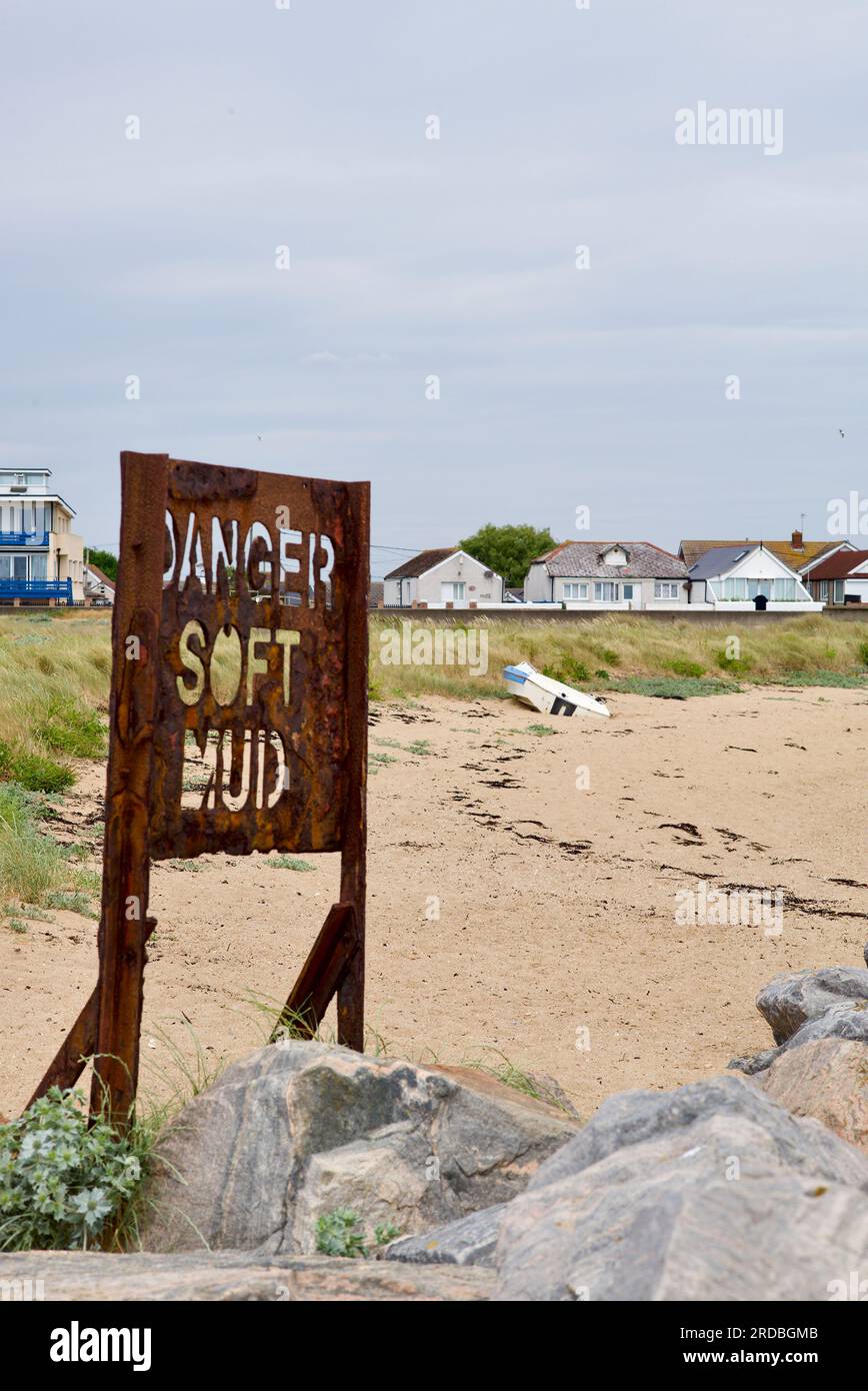 Danger Soft Mud warning sign on the beach Stock Photo Alamy