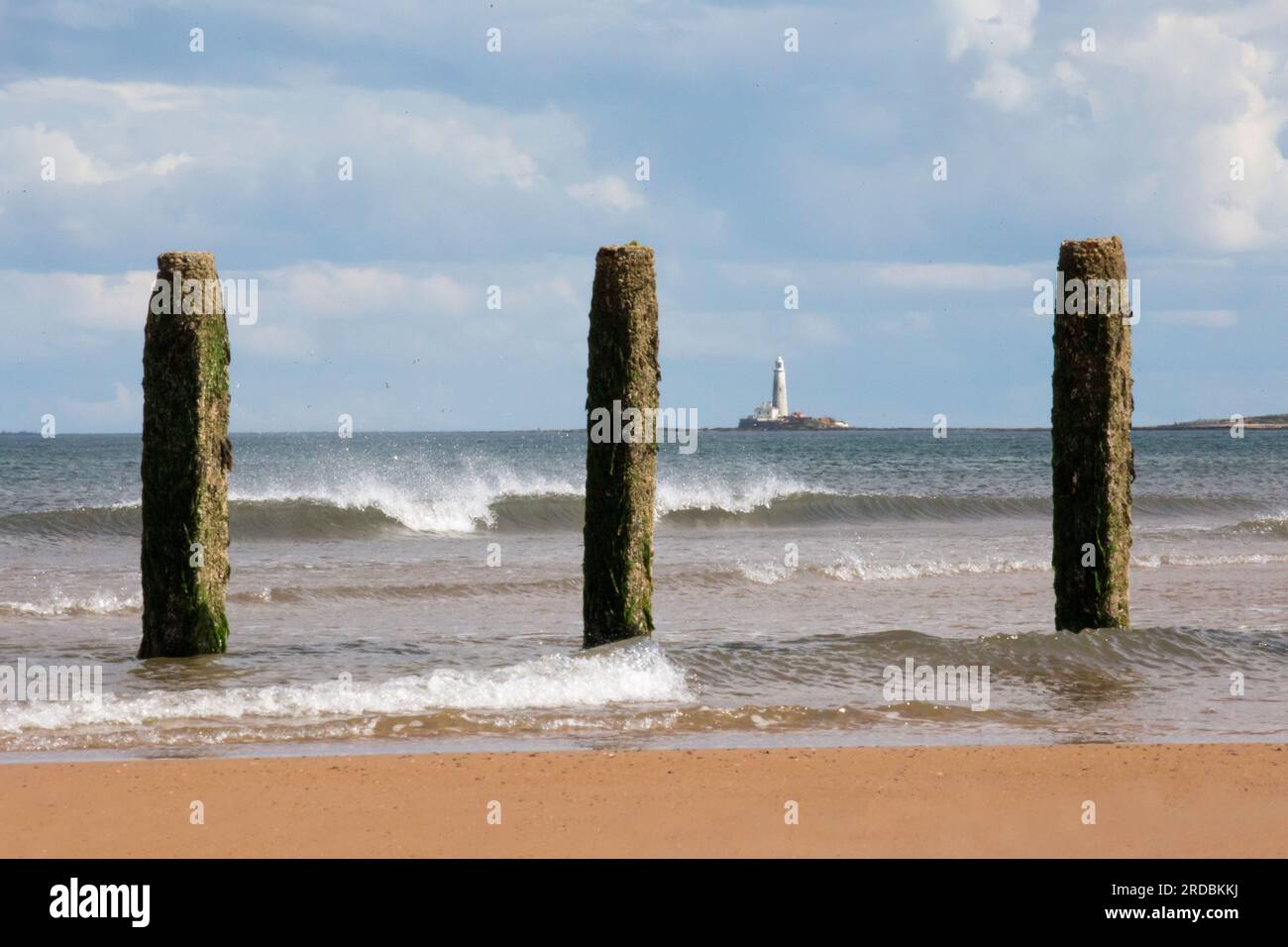 St Marys Light House Whitley Bay with posts looking from Blyth Stock