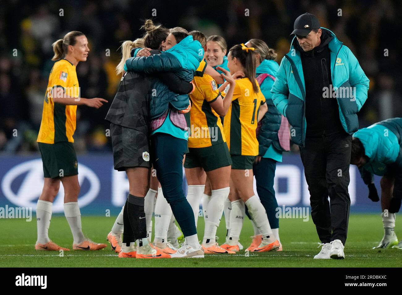 Australia's Sam Kerr, center, celebrates with Australia's goalkeeper