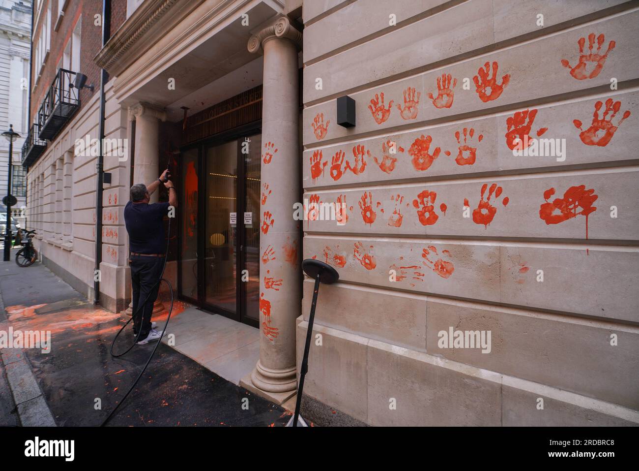 London UK. 20 July 2023  The orange paint  is washed off the exterior  of  the headquarters  of the Policy Exchange  after it was targeted by Just Stop Oil climate activists today . Policy Exchange  is an oil funded  British conservative think tank based in London which  has reportedly helped write anti protest laws targeting climate activists. Just Stop Oil have demanded an end to all new fossil fuel licences and cease new investments in oil, gas and coal .Credit amer ghazzal/Alamy Live News Stock Photo