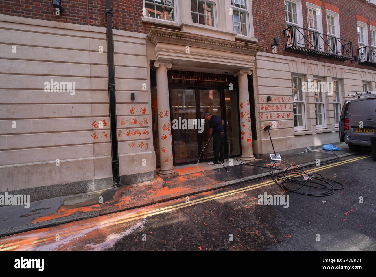 London UK. 20 July 2023  The orange paint  is washed off the exterior  of  the headquarters  of the Policy Exchange  after it was targeted by Just Stop Oil climate activists today . Policy Exchange  is an oil funded  British conservative think tank based in London which  has reportedly helped write anti protest laws targeting climate activists. Just Stop Oil have demanded an end to all new fossil fuel licences and cease new investments in oil, gas and coal .Credit amer ghazzal/Alamy Live News Stock Photo