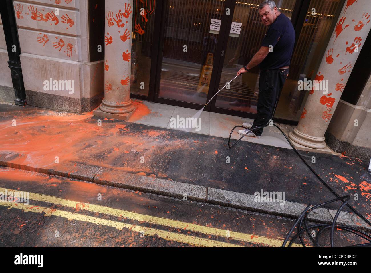 London UK. 20 July 2023  The orange paint  is washed off the exterior  of  the headquarters  of the Policy Exchange  after it was targeted by Just Stop Oil climate activists today . Policy Exchange  is an oil funded  British conservative think tank based in London which  has reportedly helped write anti protest laws targeting climate activists. Just Stop Oil have demanded an end to all new fossil fuel licences and cease new investments in oil, gas and coal .Credit amer ghazzal/Alamy Live News Stock Photo