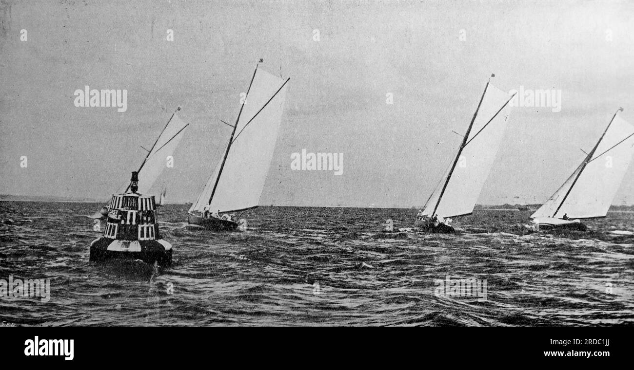 Yacht racing off Southsea with close-up of buoy. From a collection of printed advertisements and photographs dated 1908 relating to the Southsea and Portsmouth areas of Hampshire, England. Some of the originals were little more than snapshot size and the quality was variable. Stock Photo