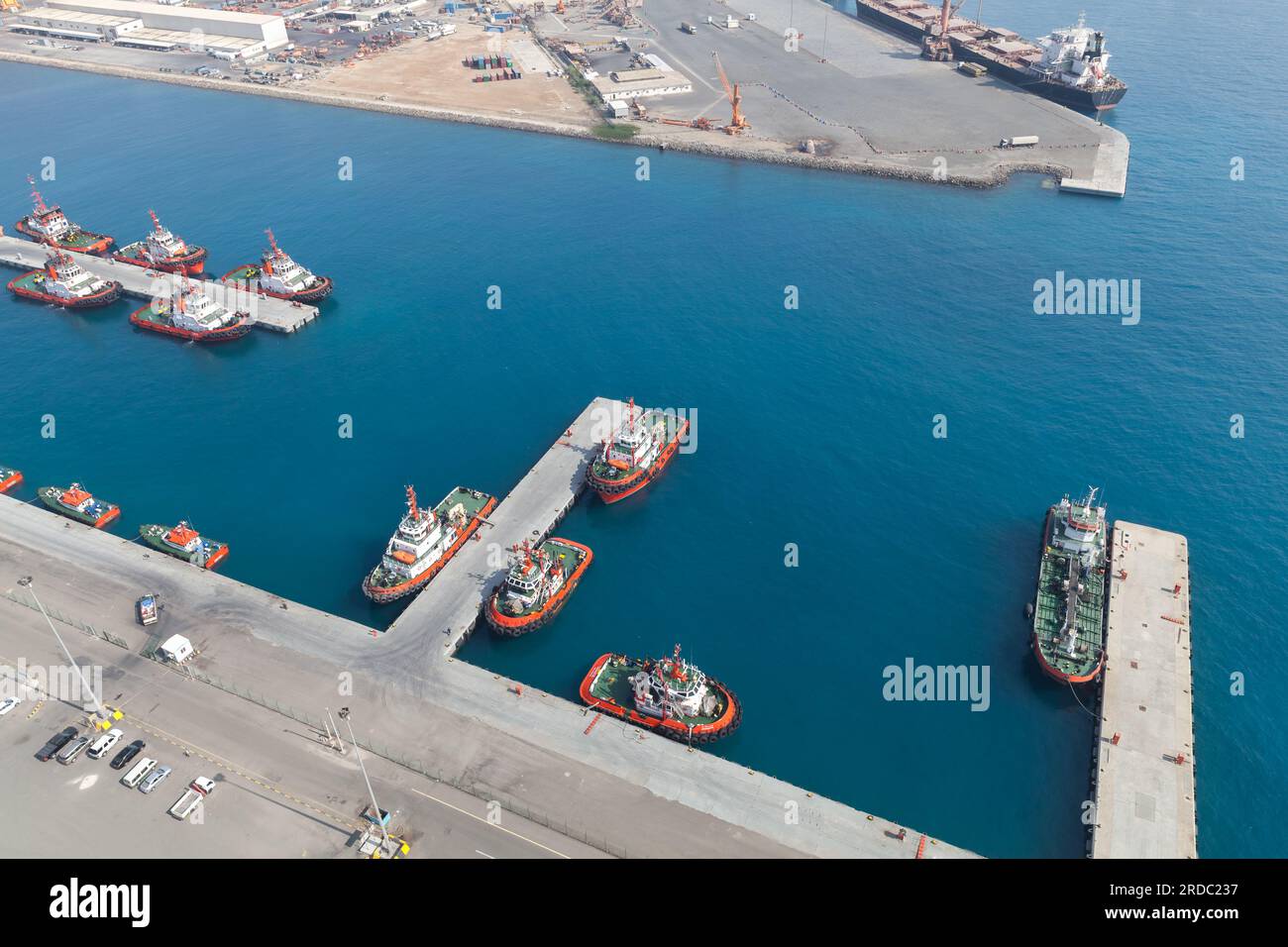 Fleet of tug boats of Jeddah Islamic Seaport, aerial photo taken on a sunny day Stock Photo