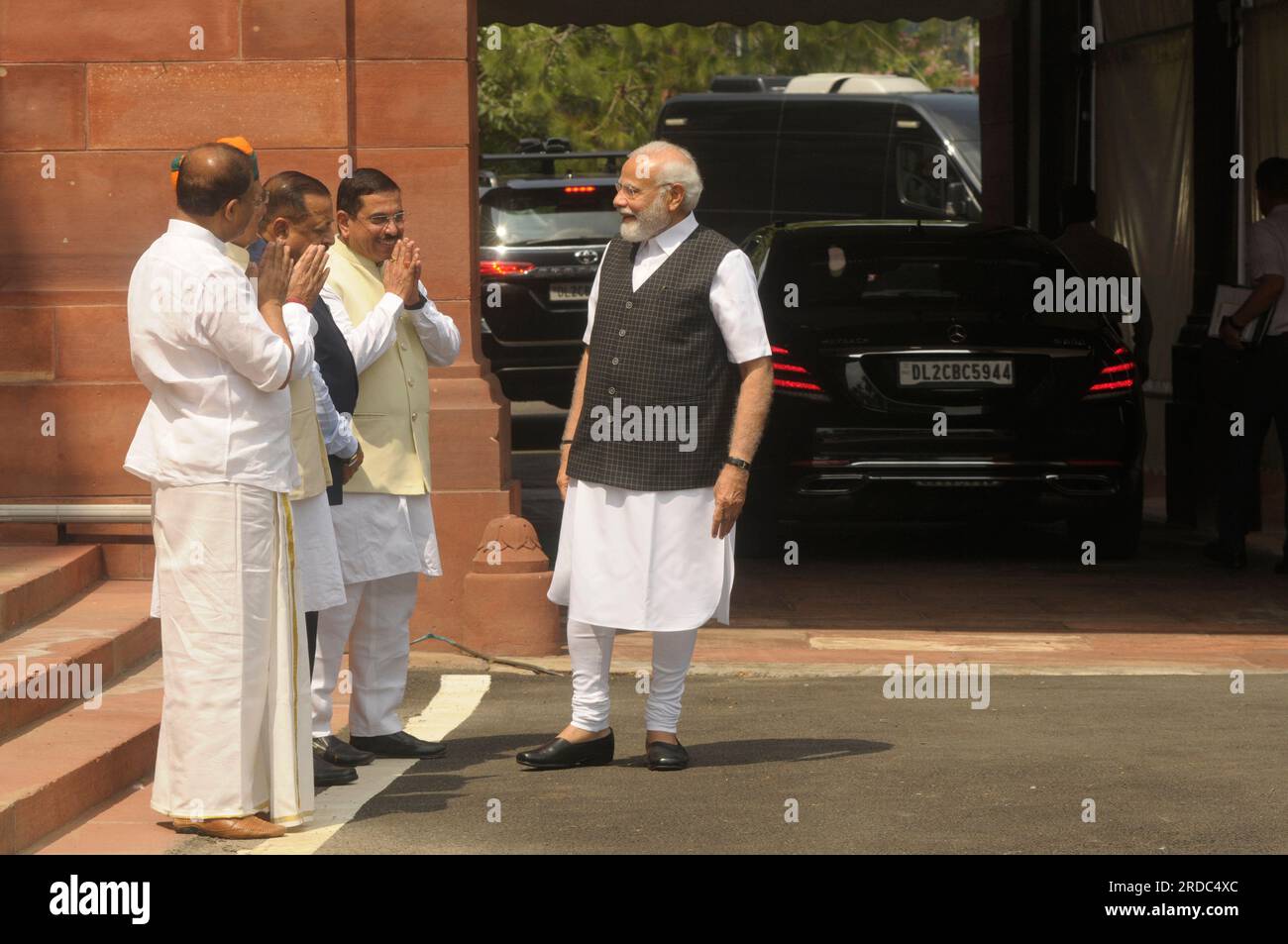 Prime Minister Narendra Modi arrives on the first day of the Indian Parliaments Monsoon Session which begins in New Delhi. The session will witness the first big faceoff between the ruling (NDA) National Democratic Alliance government and the two day old formed group of opposition parties as INDIA (Indian National Developmental Inclusive Alliance). (Photo by Sondeep Shankar/Pacific Press) Stock Photo