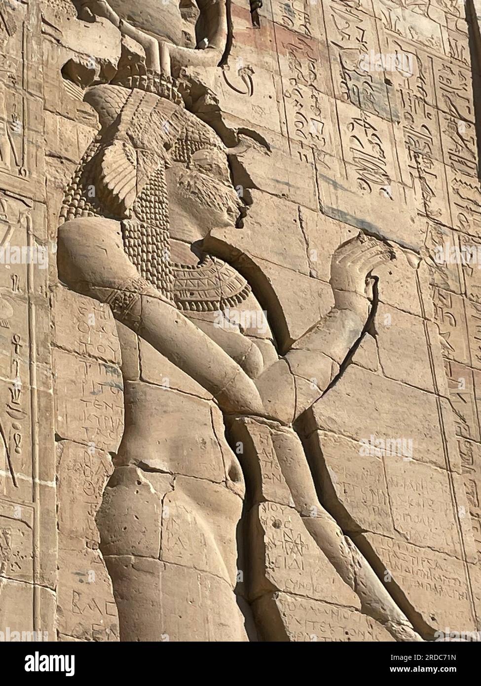 Relief carving of the goddess Isis at Philae Temple UNESCO World Heritage Site, Agilika, Egypt Stock Photo