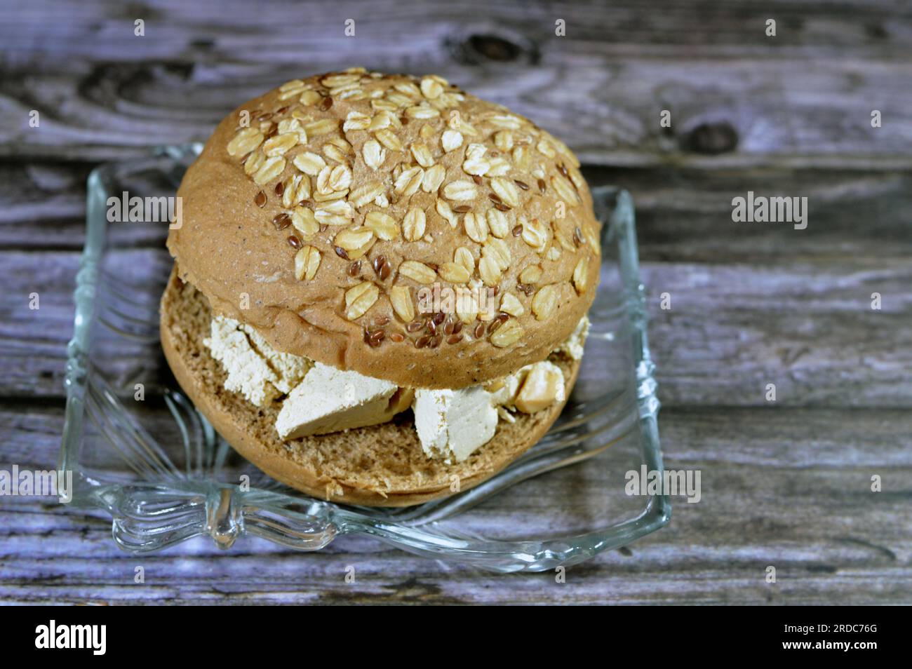 Traditional tahini halva with peanuts or Halawa Tahiniya in a wheat oat