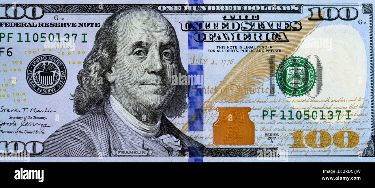 Large fragment of the Obverse side of 100 one hundred dollars bill banknote series 2017 with the portrait of president Benjamin Franklin, American mon Stock Photo