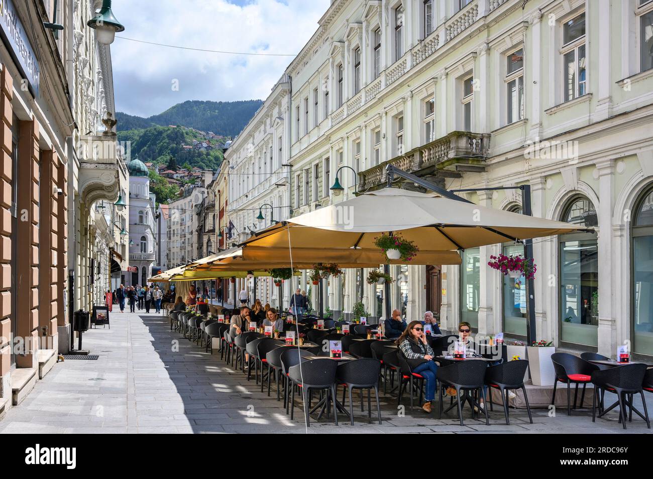 Outdoor cafeterias on the Strossmayerova promenade in central Sarajevo,  Bosnia Herzegovina, Balkan Peninsula, Eastern Europe. Stock Photo