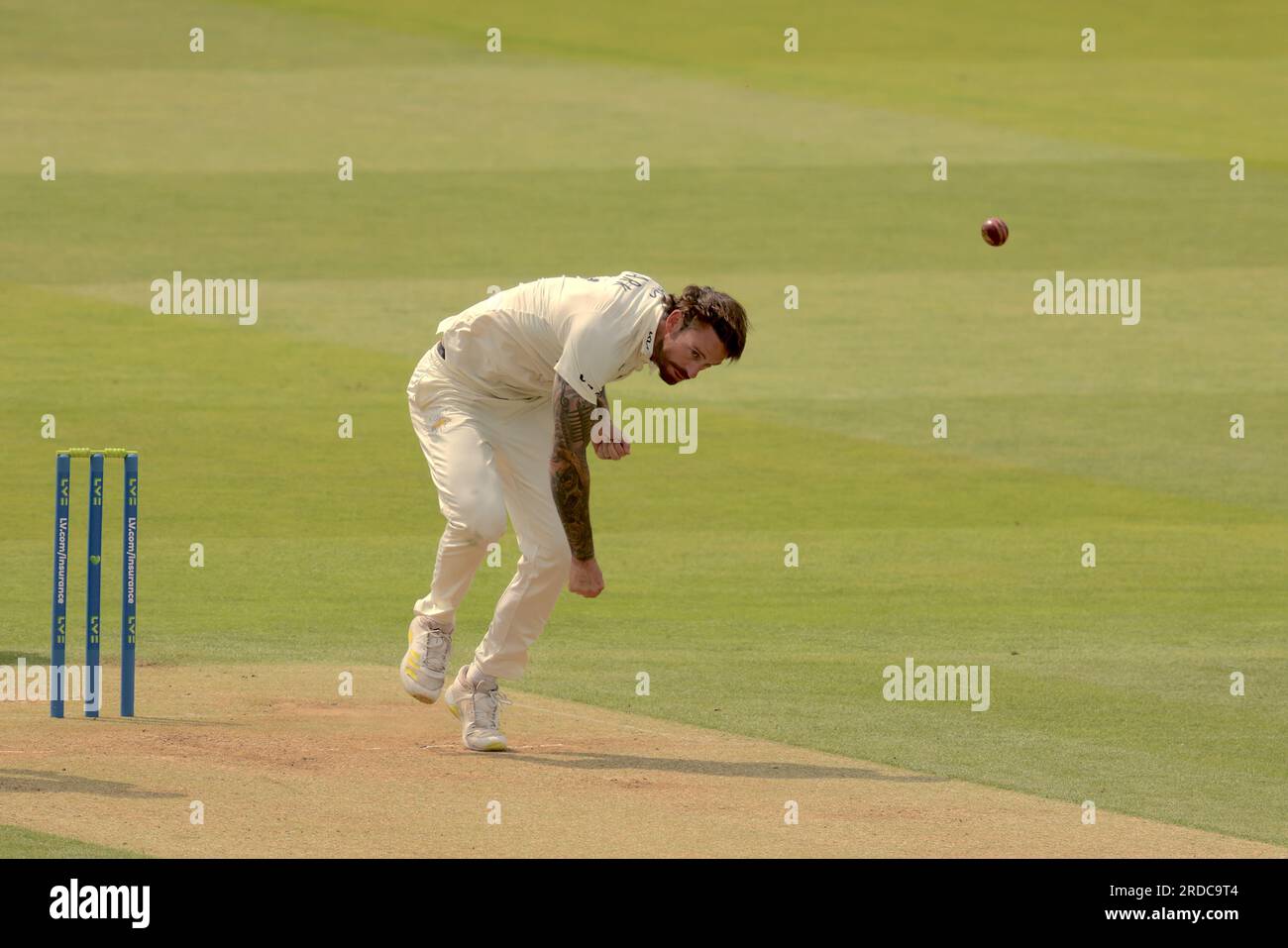 London, UK. 20th July, 2023. Surrey's Jordan Clark bowling as Middlesex take on Surrey on day two of the County Championship match at Lords. Credit: David Rowe/Alamy Live News Stock Photo